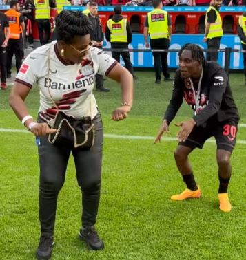 Bernice Frimpong dancing with her son Jeremie Frimpong after Bundesliga triumph